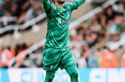 米兰体育地址-利物浦资深门将阿利松荣膺2021年西班牙最佳门将，史上首位获此殊荣的外籍球员的简单介绍